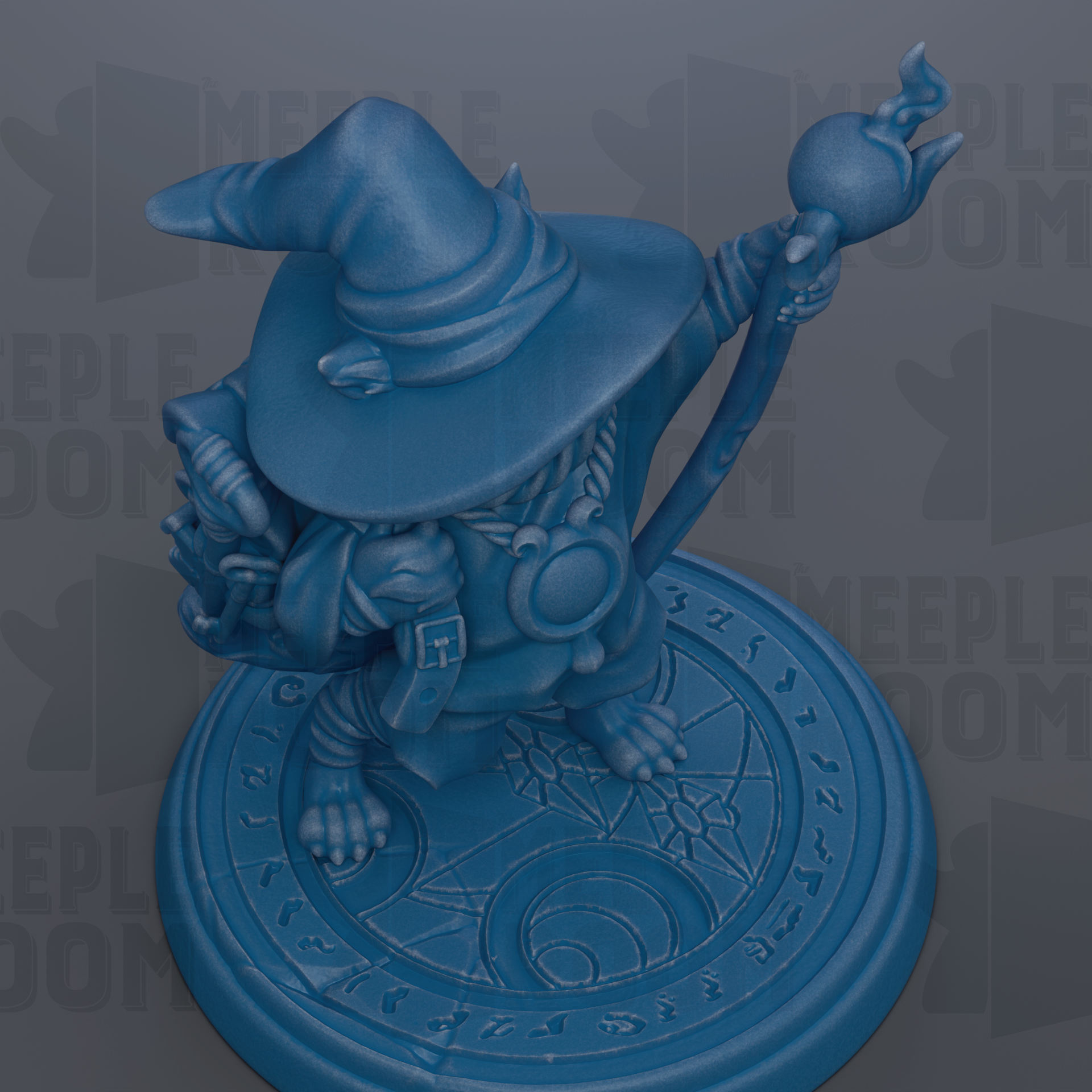 A blue figurine of a wizard or magical character, wearing a pointed hat and holding a staff, is depicted on a circular base with a patterned design.