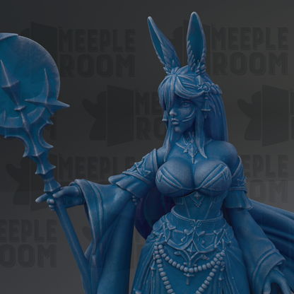 A blue fantasy female character with long hair and a flowing robe, holding a staff and wearing a headdress, is depicted in the image.
