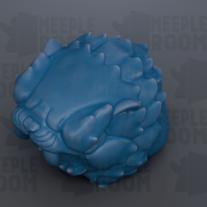 A blue, textured object resembling a ball or sphere, with a repeating pattern of curved lines and shapes.