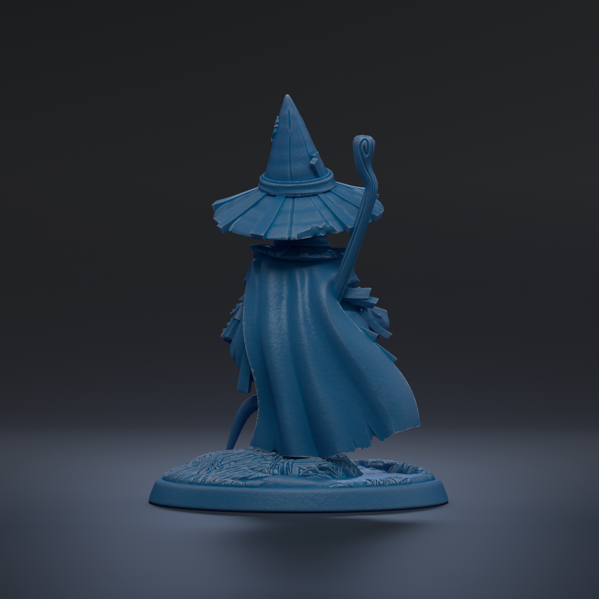 A blue figurine of a wizard or magical figure, wearing a pointed hat and holding a staff, standing on a base against a dark background.