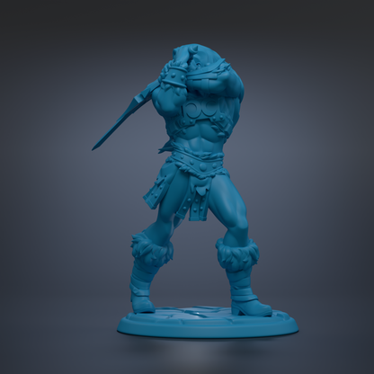 A blue figurine of a muscular warrior figure holding a sword and standing on a base.