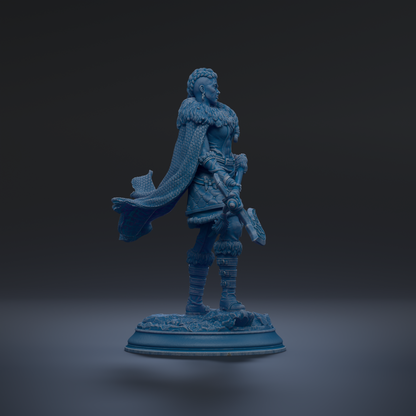 A blue statue of a woman standing on a pedestal, wearing a cape and holding a weapon.