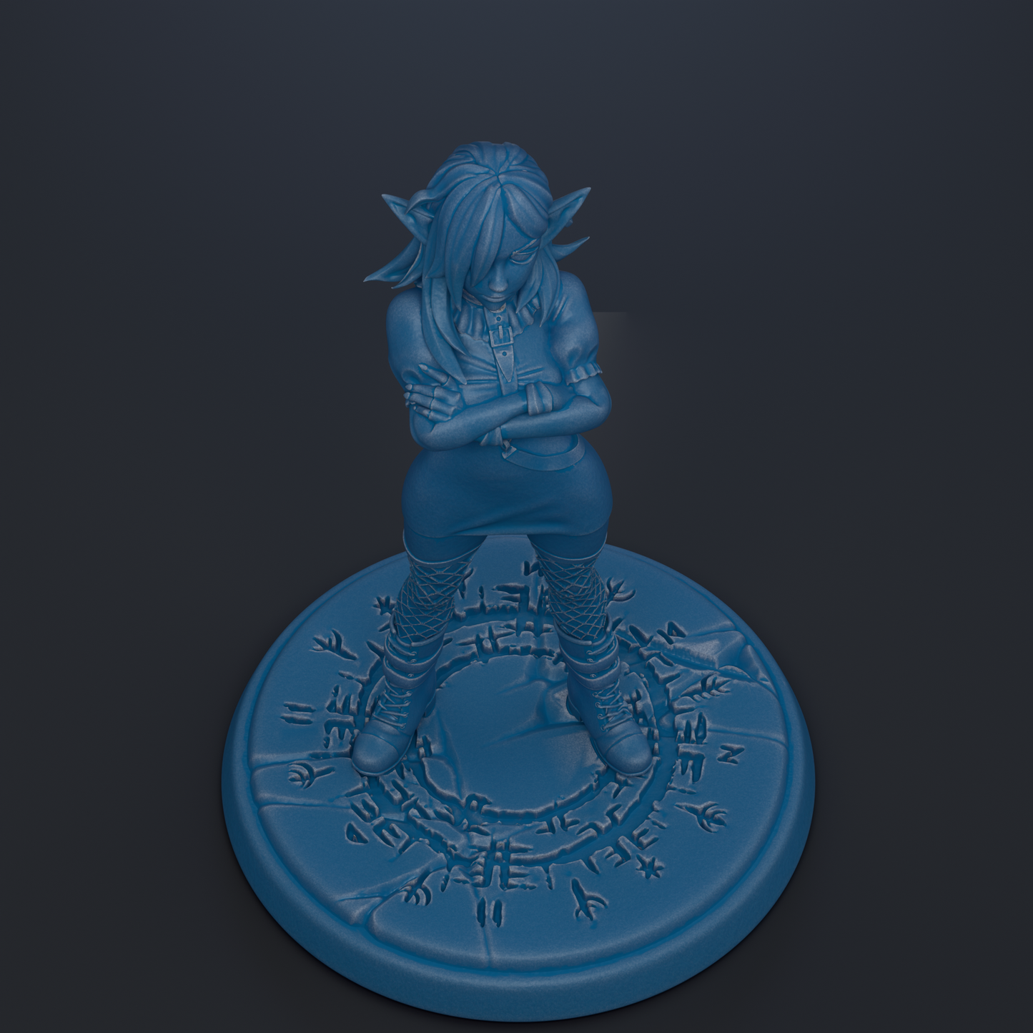 A blue figurine of a person with long hair and a serious expression stands on a circular base with intricate designs.