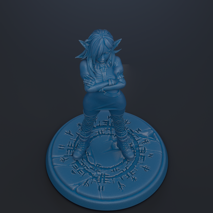 A blue figurine of a person with long hair and a serious expression stands on a circular base with intricate designs.