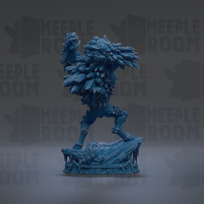 A blue, icy-looking statue of a creature with a large head and long, sharp teeth, standing on a rock formation.