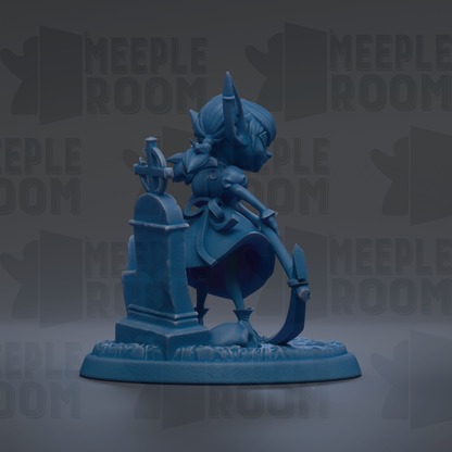 A blue figurine of a character with horns and a sword, standing on a pedestal.