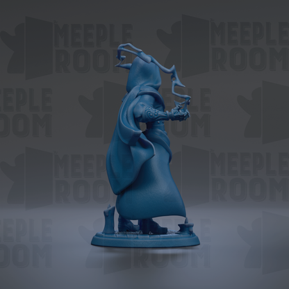 A blue figurine of a person with a flowing robe and a hood, standing on a base and holding a small object in their hand.