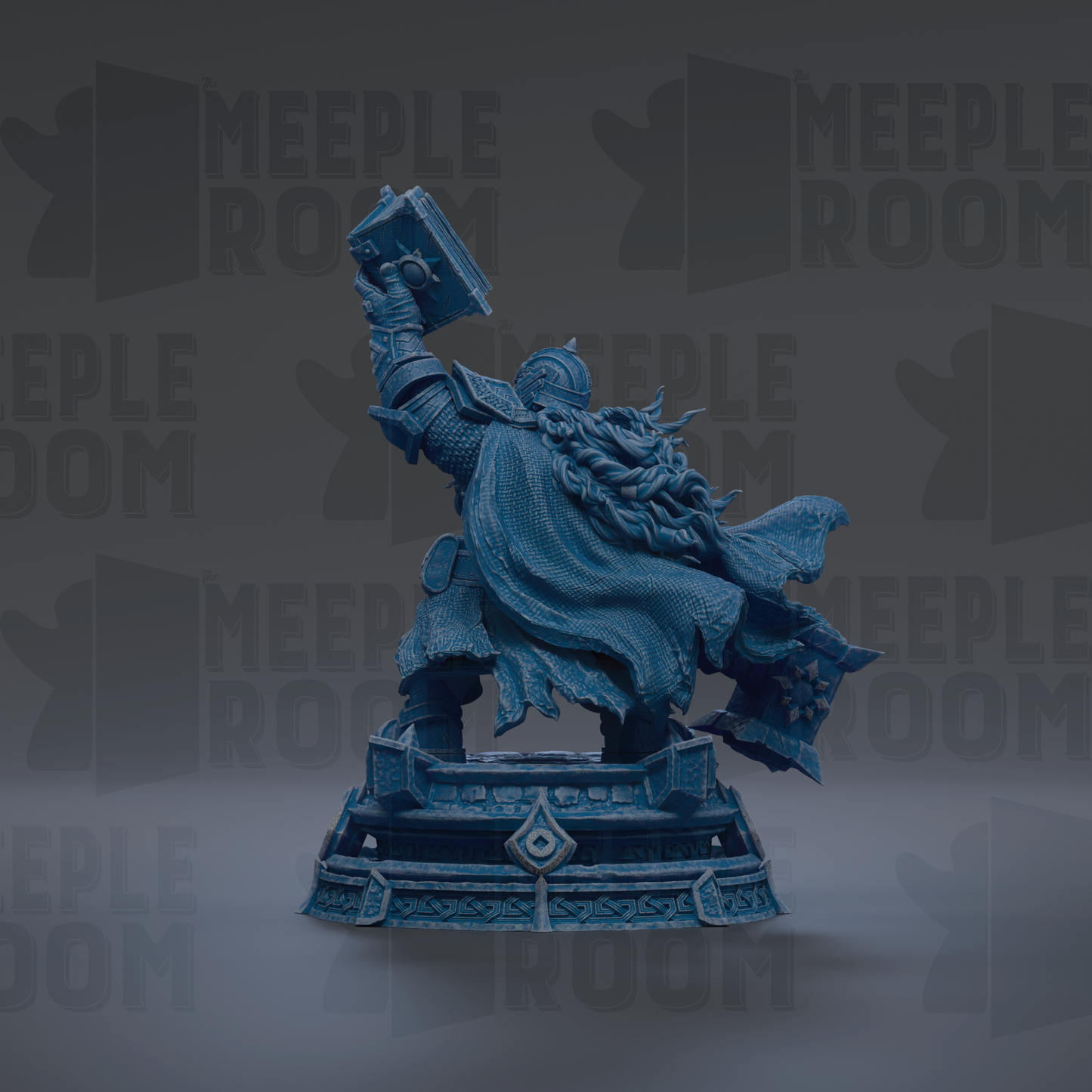 A blue statue of a figure holding a book and standing on a pedestal.