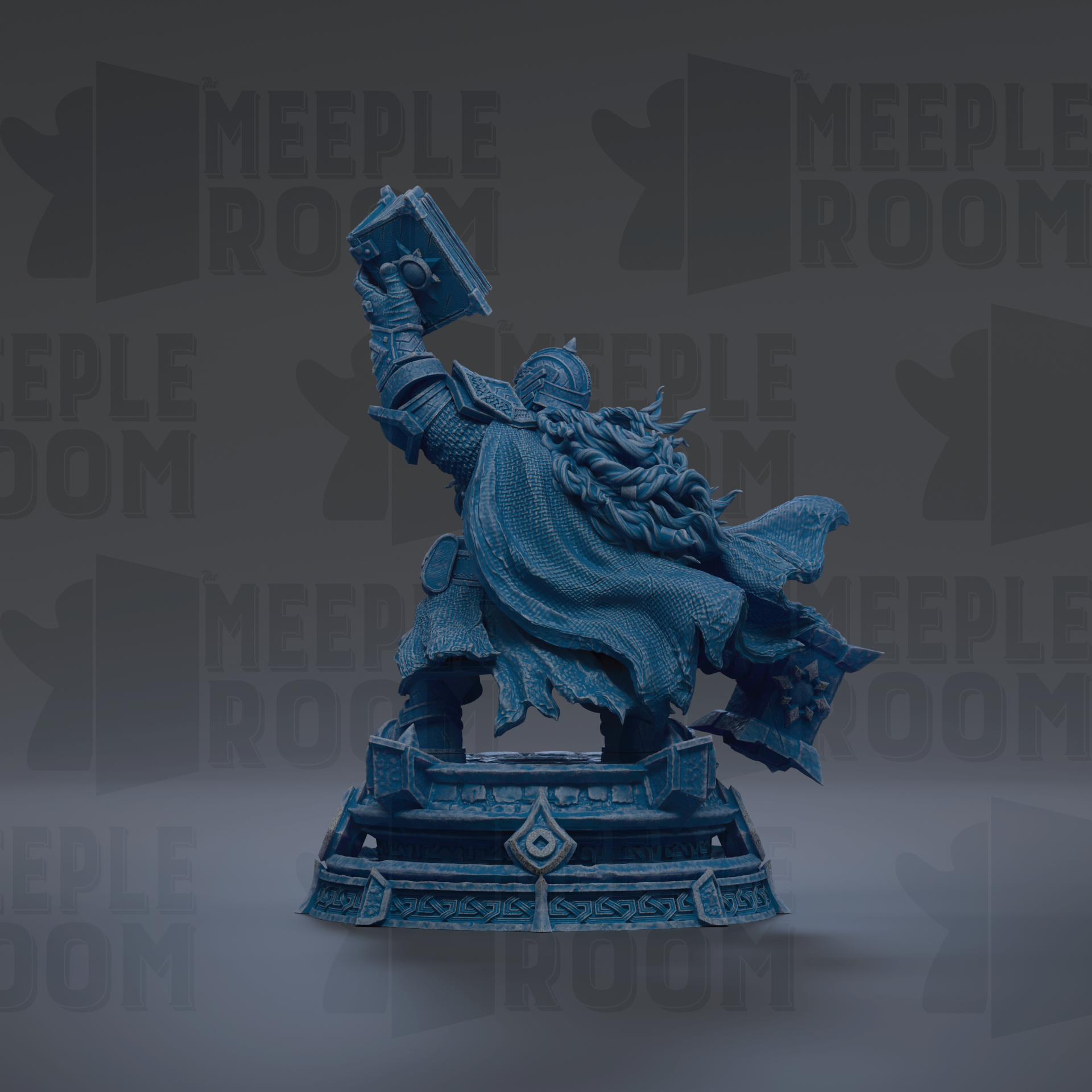 A blue statue of a figure holding a book and standing on a pedestal.