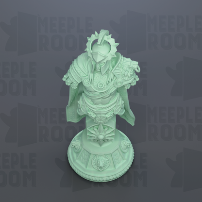 A green statue of a warrior figure with a crown and shield, standing on a pedestal with various decorative elements.