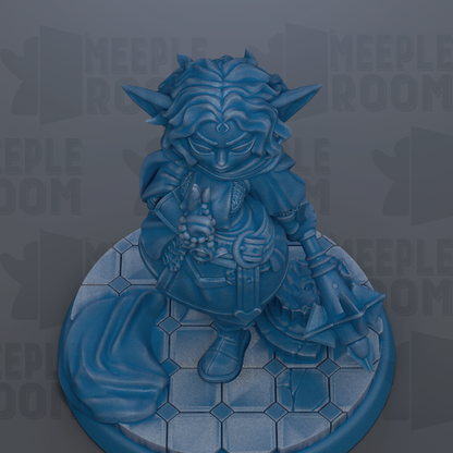 A blue figurine of a character with a long beard and horns, standing on a hexagonal base.