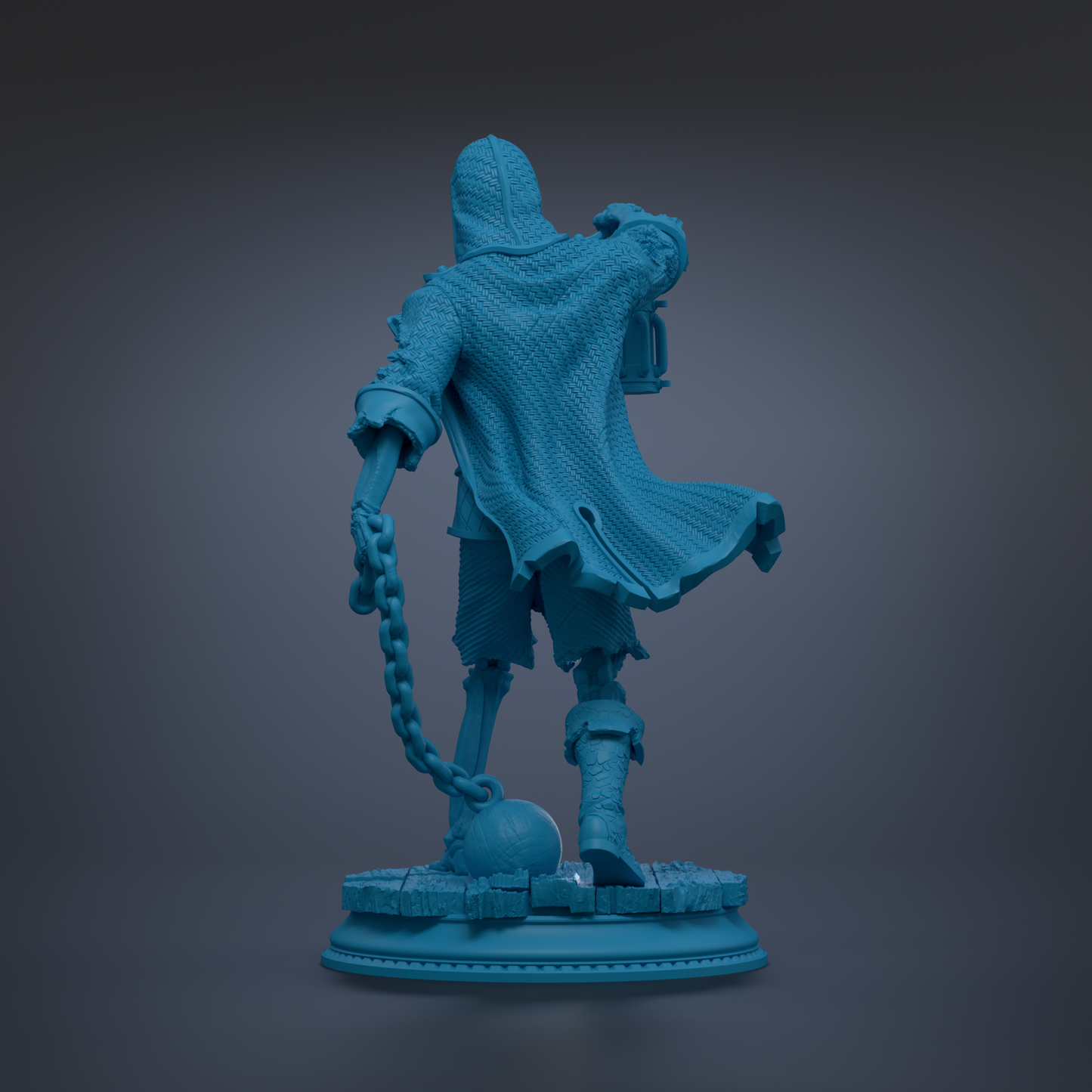 A blue statue of a person with a chain around their neck and a hooded cloak, standing on a platform.
