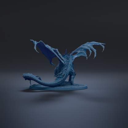 A blue dragon figurine with outstretched wings is shown against a dark background.