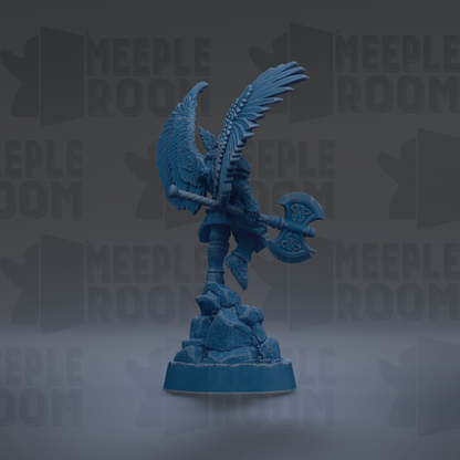 A blue figurine of a winged warrior holding a large weapon, standing on a rocky base against a dark background with repeated text.