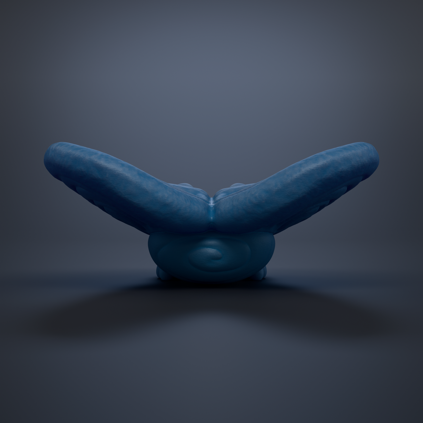 A blue, curved object resembling a bird or sea creature is shown against a dark background.