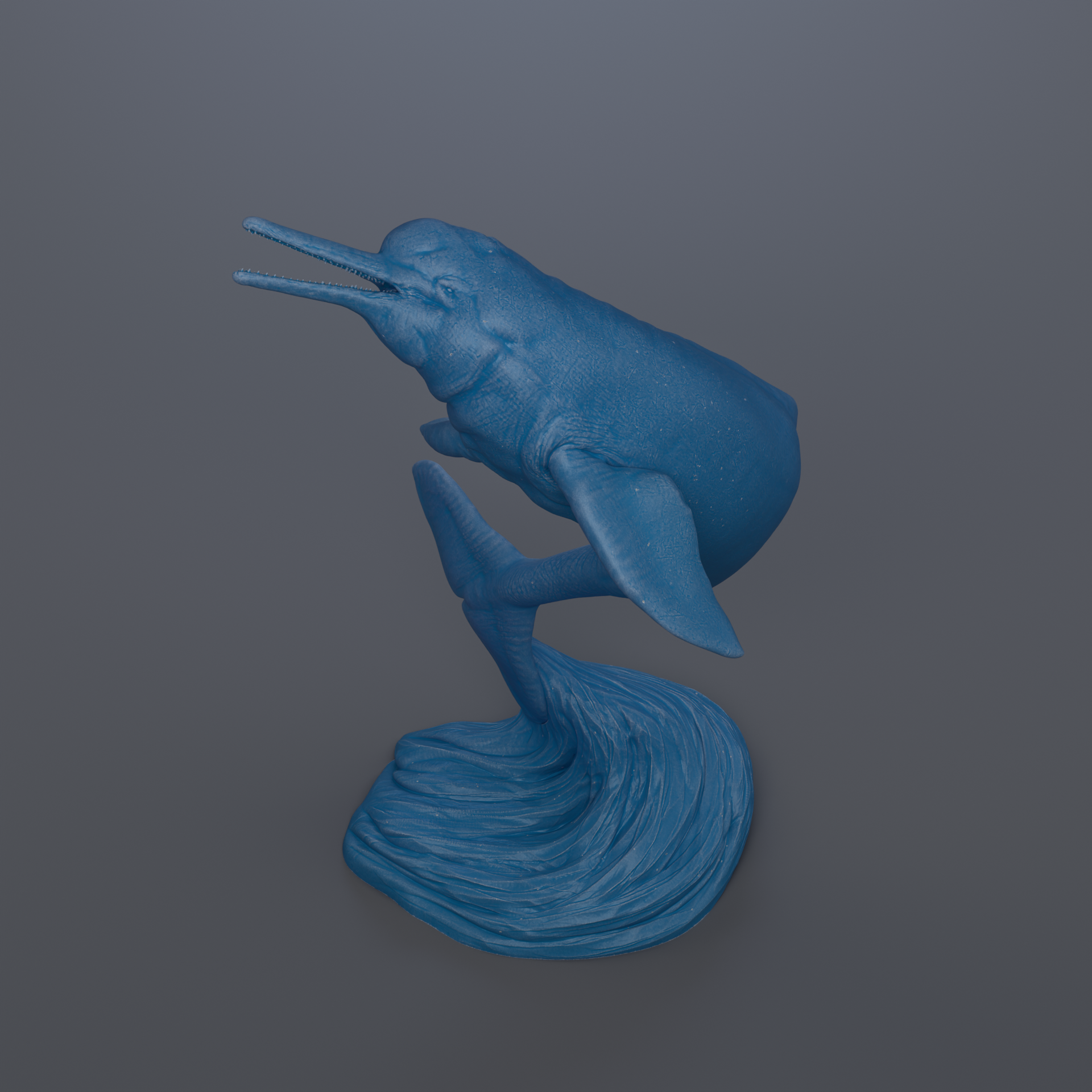 A blue plastic toy fish figurine is shown against a gray background.