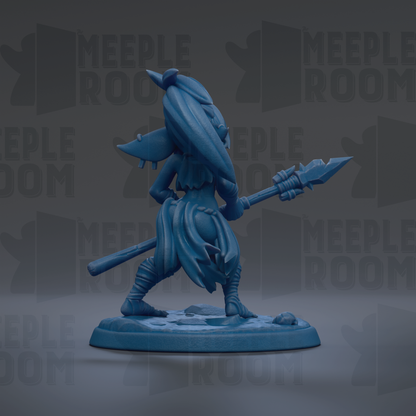A blue figurine of a warrior wielding a spear and shield, standing on a base.