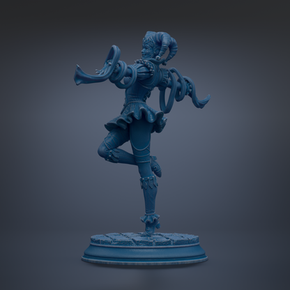 A blue statue of a dancing figure with horns and a flowing skirt, standing on a pedestal.