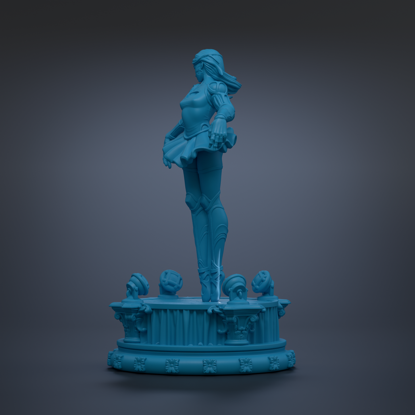 A blue statue of a woman standing on a pedestal with other statues on it.