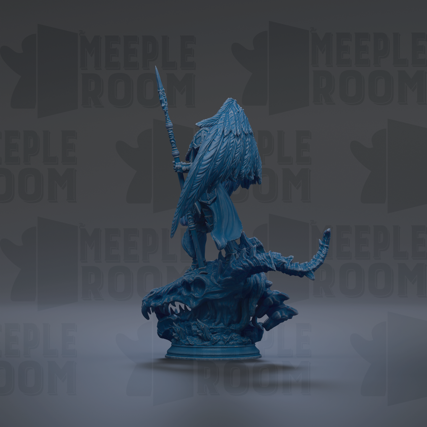 A blue figurine of a winged creature, possibly a dragon or serpent, standing on a rock formation.