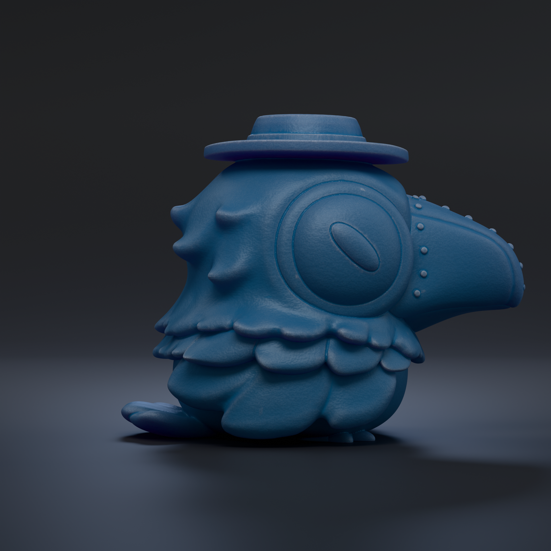 A blue, spiky bird figurine wearing a hat, sitting on a dark surface.