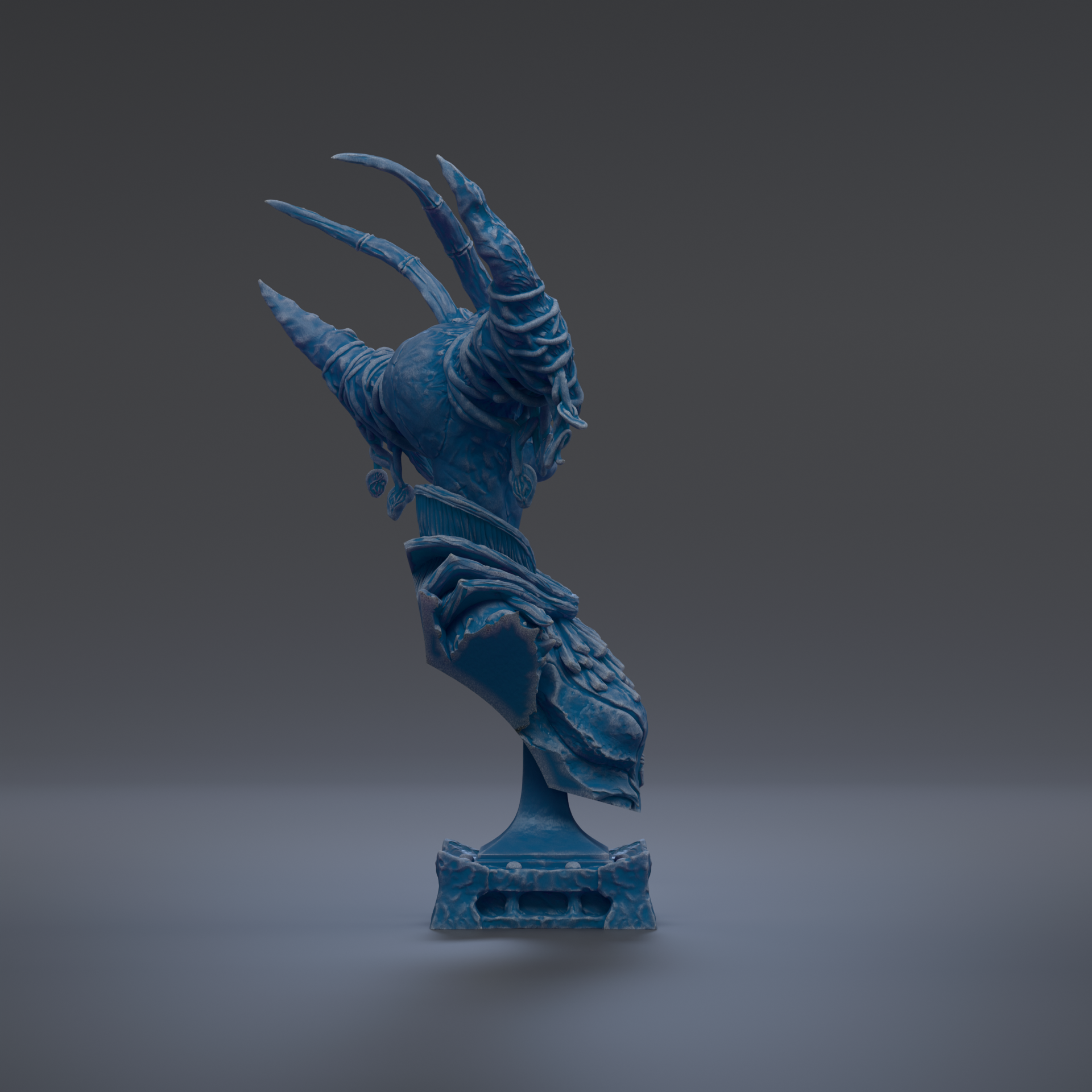 A blue, abstract sculpture with a unique, organic shape stands on a base against a dark background.