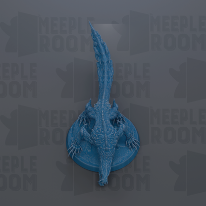 A blue, stylized dragon figurine is displayed against a dark background with repeated text.