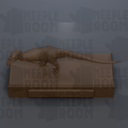 a large, brown dinosaur statue, likely a sauropod, displayed on a rectangular platform.