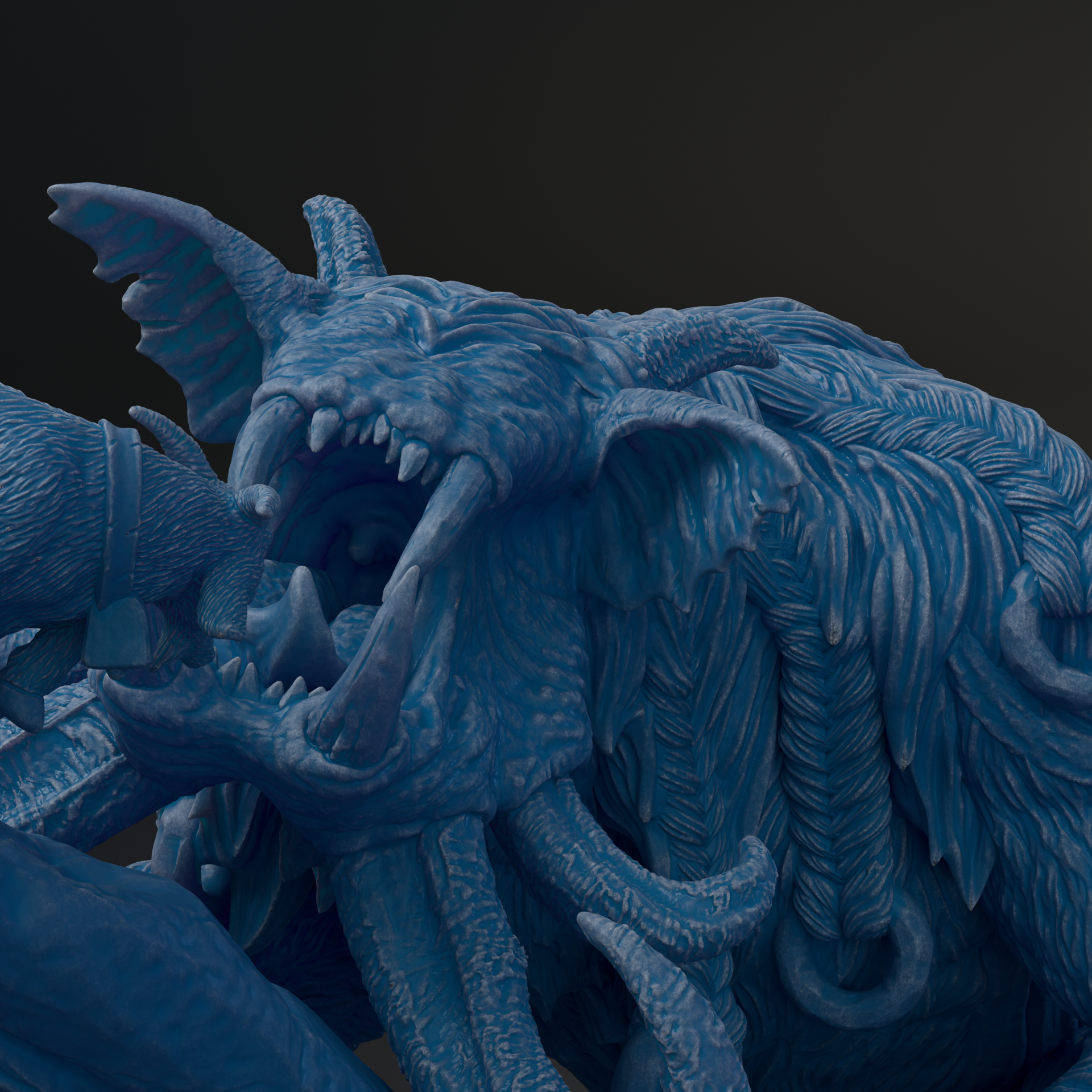 A close-up view of a detailed, intricate blue sculpture depicting a fierce-looking creature with sharp teeth and claws.