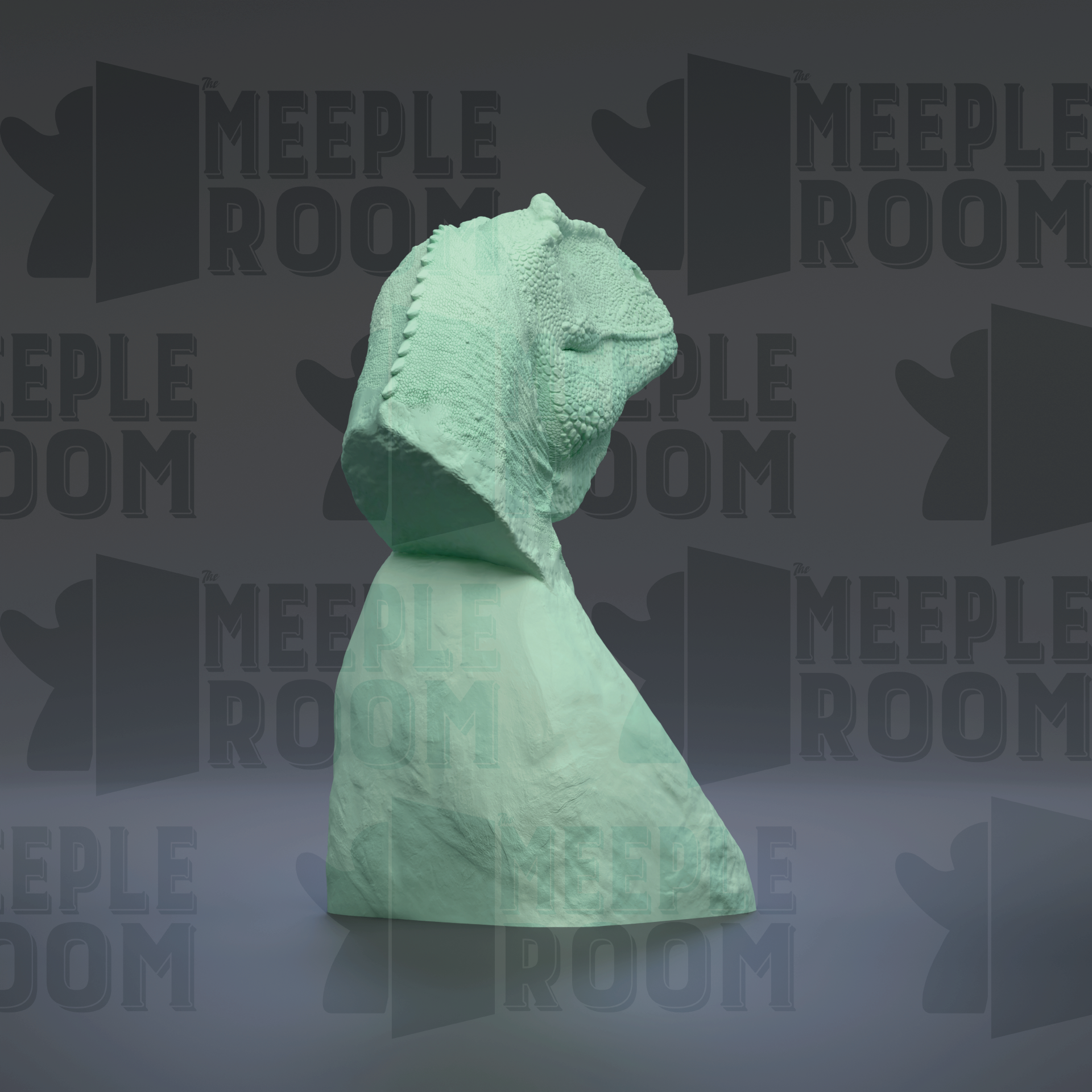 A green, textured sculpture is displayed against a dark background with repeated text and logos.