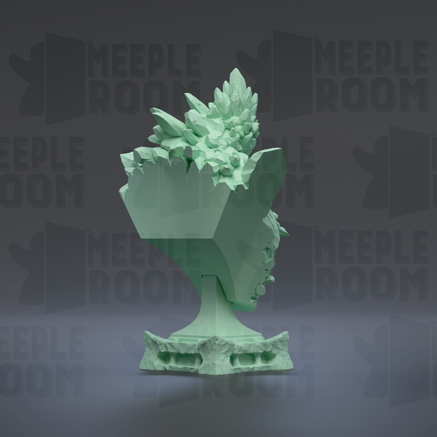 A green, 3D-rendered sculpture of a stylized head or face, with intricate details and a textured surface.