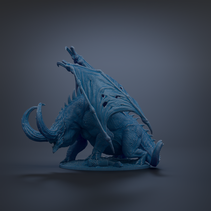 A blue dragon figurine with large wings and sharp teeth is depicted in the image.