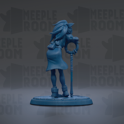 A blue figurine of a woman with long hair and a staff, standing on a base.