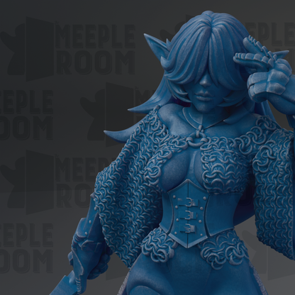A close-up of a detailed, blue-colored statue depicting a female character with intricate, flowing hair and ornate clothing.