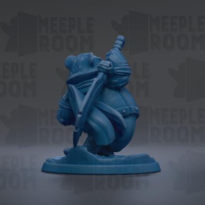 A blue figurine of a character with a sword and shield, standing on a base.