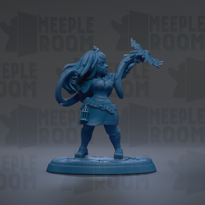 A blue figurine of a woman holding a bird, standing on a base.