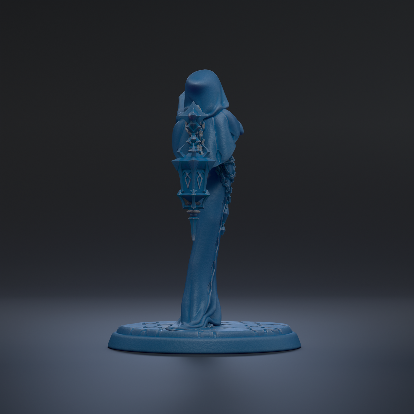A blue statue of a person standing on a base, with a dark background.