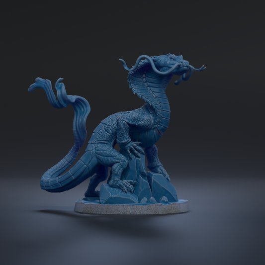 A 3D rendering of a blue dragon statue with flowing, curled tail and sharp teeth, standing on a rock formation against a dark background.