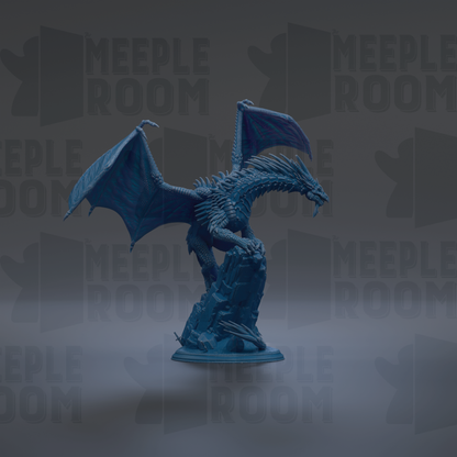 A blue dragon figurine is depicted in a dynamic pose, with its wings spread wide and its head turned to the side. The dragon is standing on a rock formation, giving it a sense of power and majesty. The background is dark, which contrasts with the dragon and makes it stand out prominently. The image does not contain any text or other discernible objects, and the dragon is the sole focus of the composition.