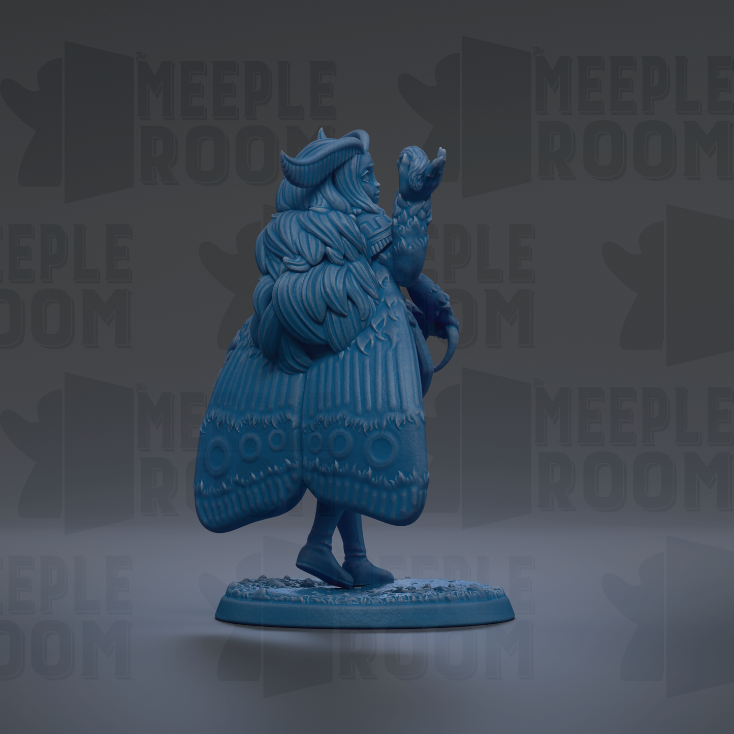 A blue figurine of a winged creature with a long tail, standing on a base and holding a small object in its hand.