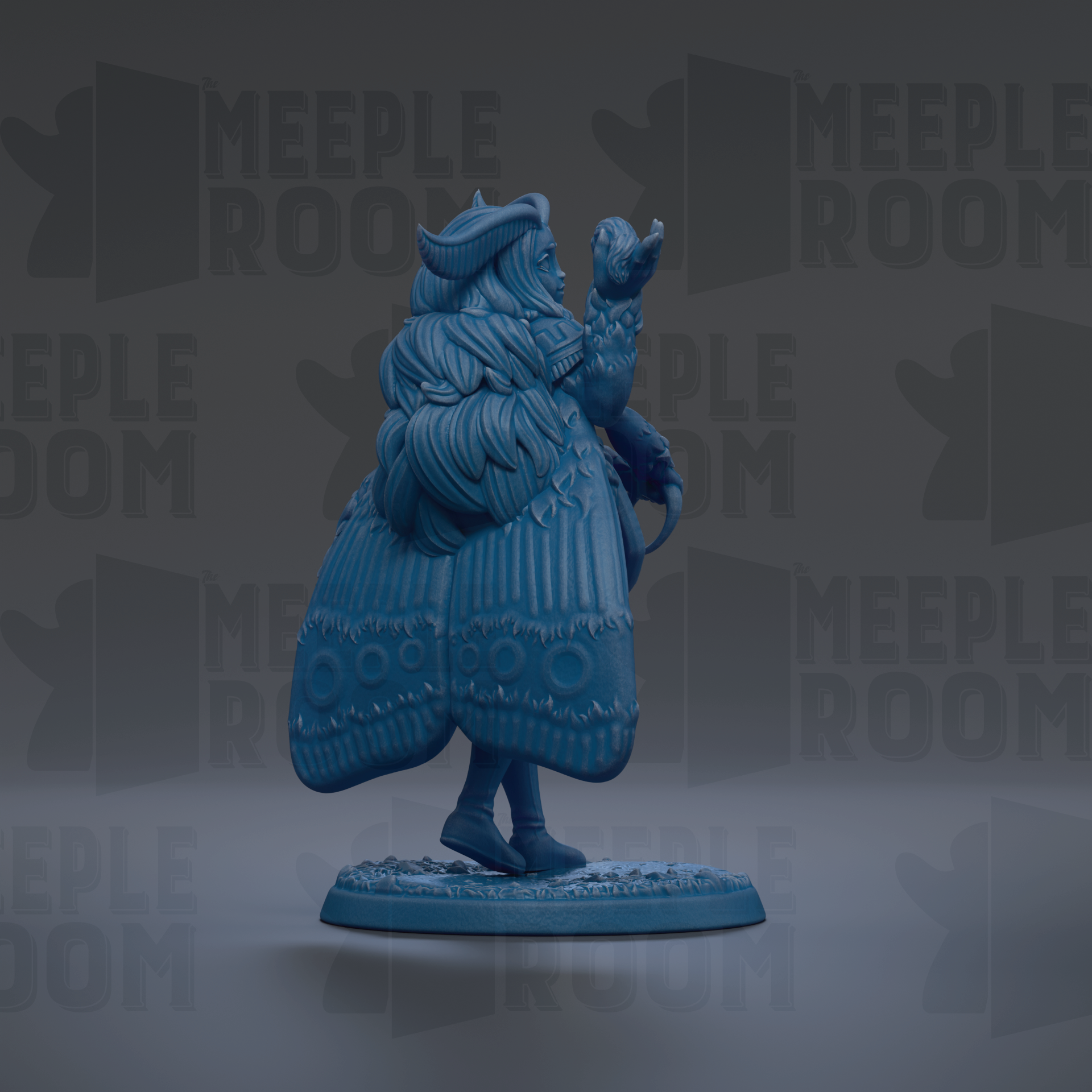 A blue figurine of a winged creature with a long tail, standing on a base and holding a small object in its hand.