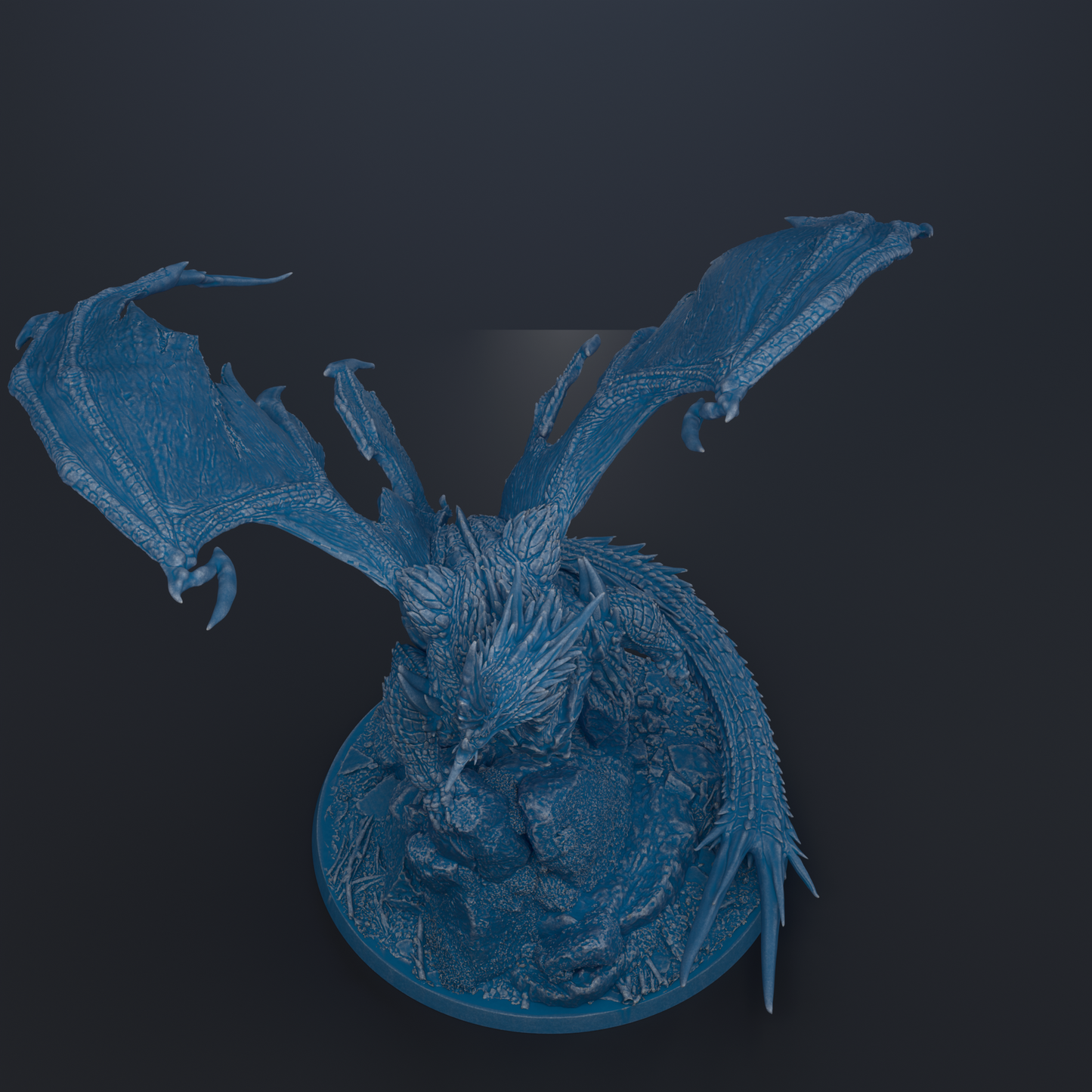 A blue dragon figurine with wings spread out, sitting on a base.