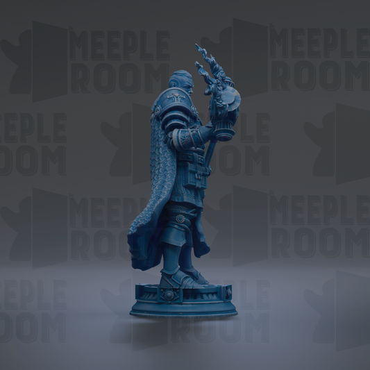 A blue statue of a person standing on a pedestal, holding a shield and a staff.