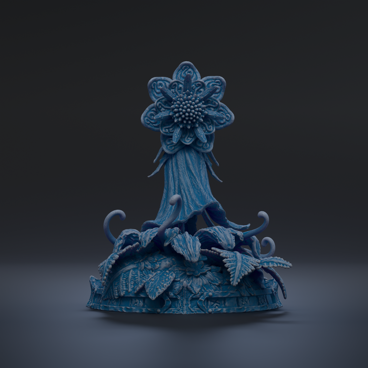 A blue, ornate sculpture with a large flower-like structure at the center, surrounded by intricate leaf-like patterns.