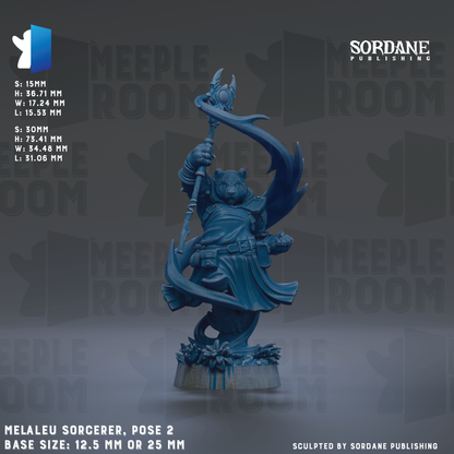 a blue statue of a woman holding a staff