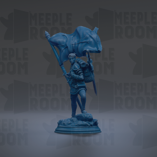 A blue statue of a person holding a flag, standing on a pedestal.