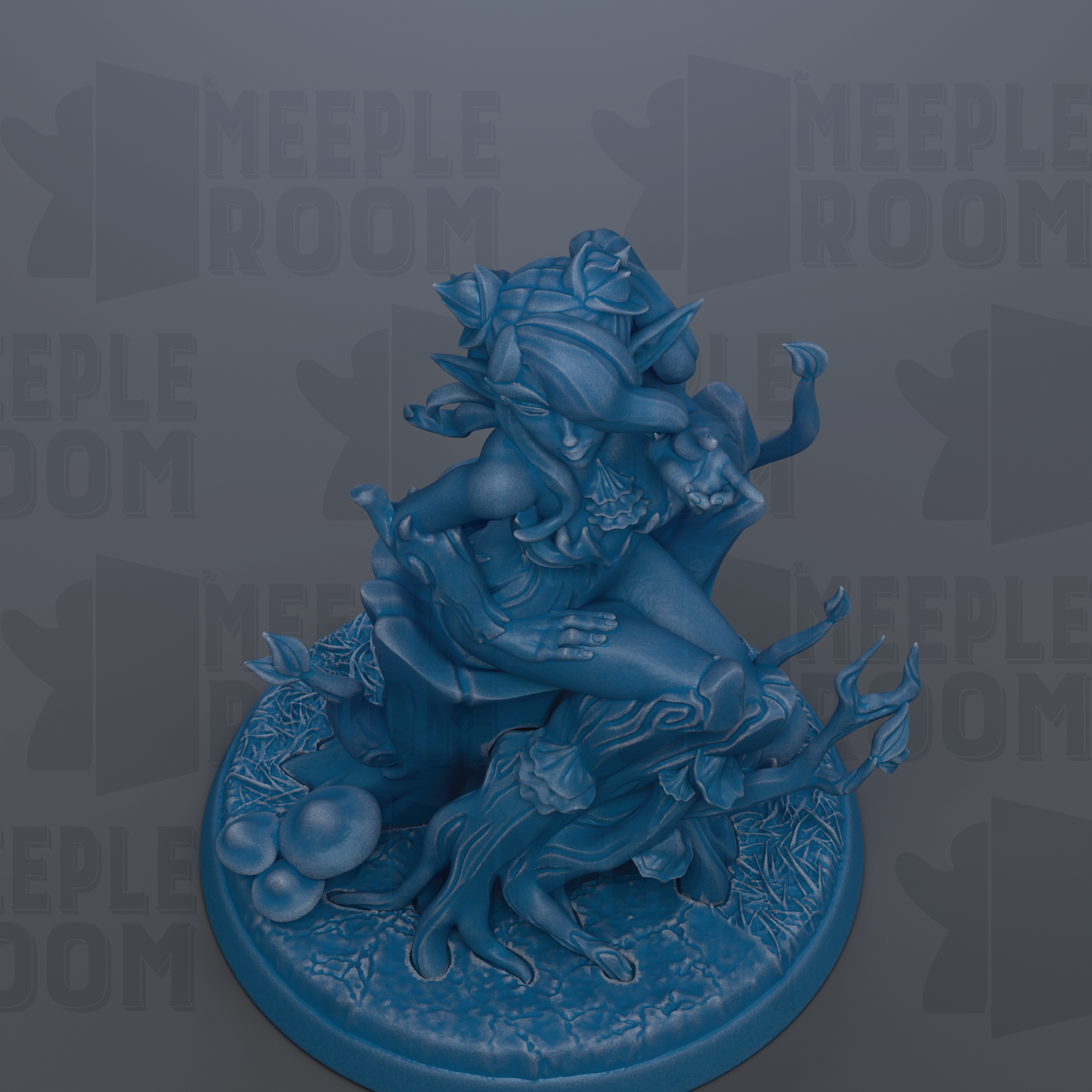 A blue figurine of a fantastical creature with intricate details and a whimsical expression, sitting on a base with leaves and other natural elements.