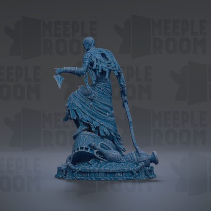 A blue statue of a figure holding a spear and shield, standing on a pedestal.