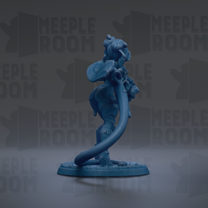 A blue figurine of a cat-like creature with a long tail and a pointed hat, standing on a base.