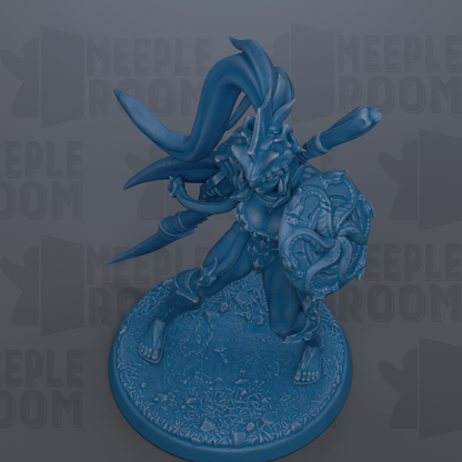 A blue figurine of a warrior-like character with a large headdress and wielding a sword, standing on a base with a textured surface.